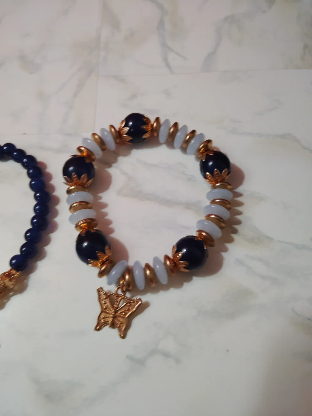 Gold Butterfly Charm Navy Bead Stretch Bracelet